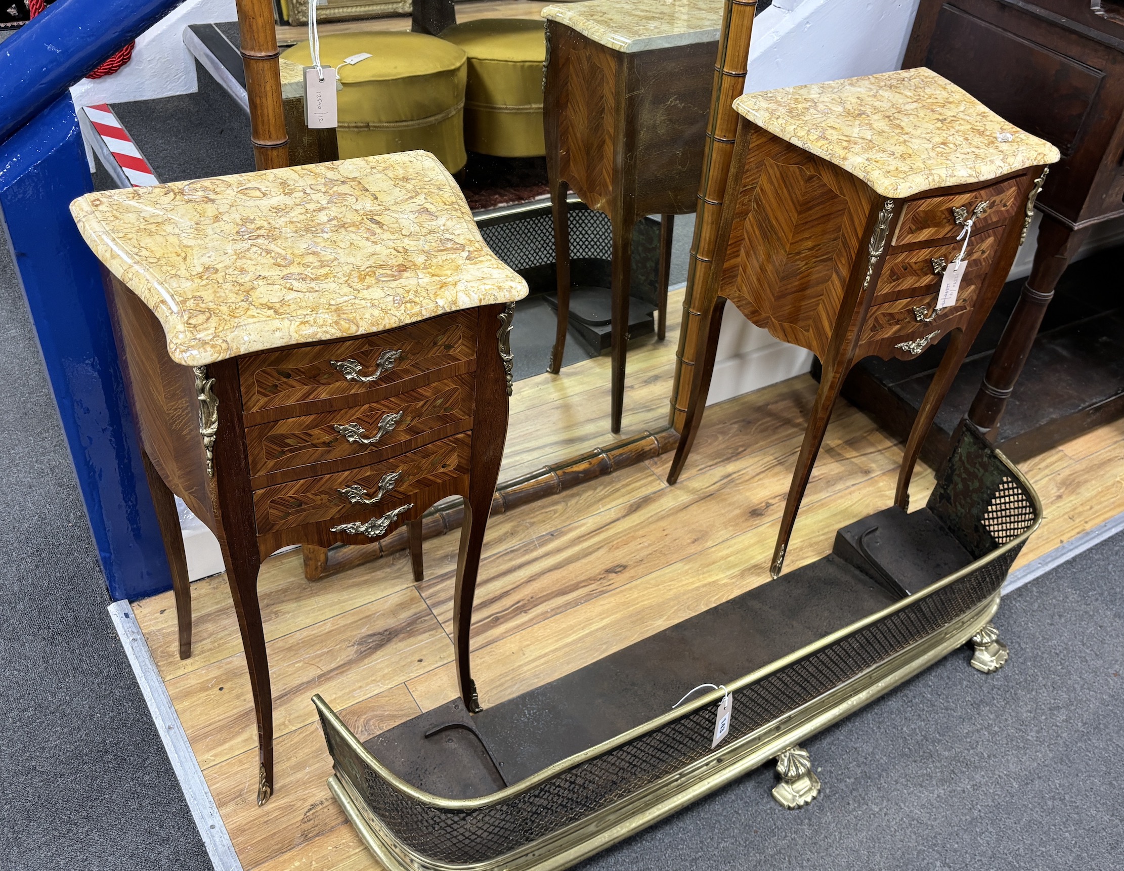 A pair of Louis XV style gilt metal mounted marquetry inlaid kingwood marble topped bedside chests, width 40cm, depth 29cm, height 73cm